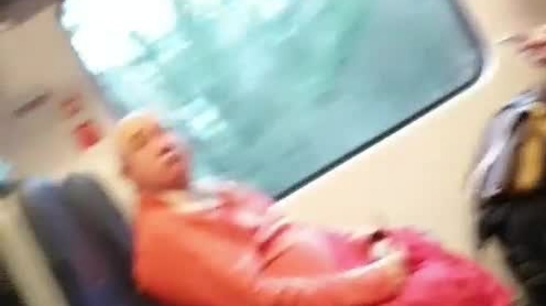 Surrounded by bald Saint Commutercels on a train