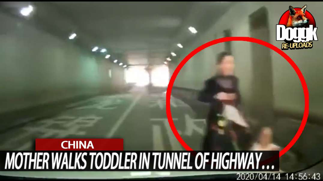 MOTHER WALKS TODDLER in TUNNEL of HIGHWAY... (CHINA)