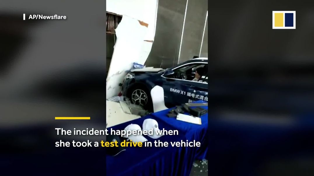 Chinese woman plunges BMW into car dealership while taking a test drive