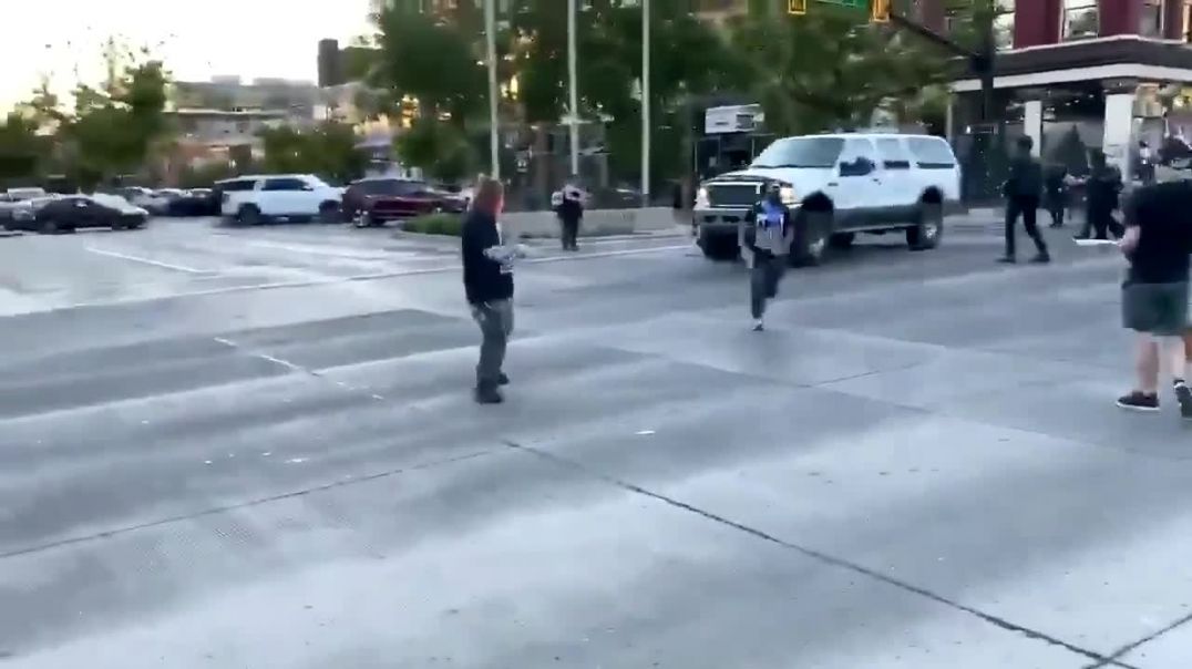 antifa fires 2 shots at citizen in truck just before driving away.