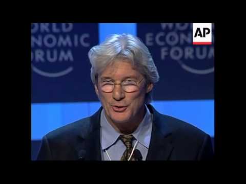 Lionel Richie and Richard Gere receive award at World Economic Forum a mr gerbil up the ass man these people are the one