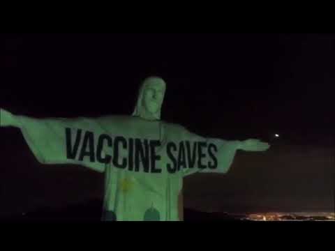 Redeemer statue in Brazil lit up with a message of of the Poison Injection