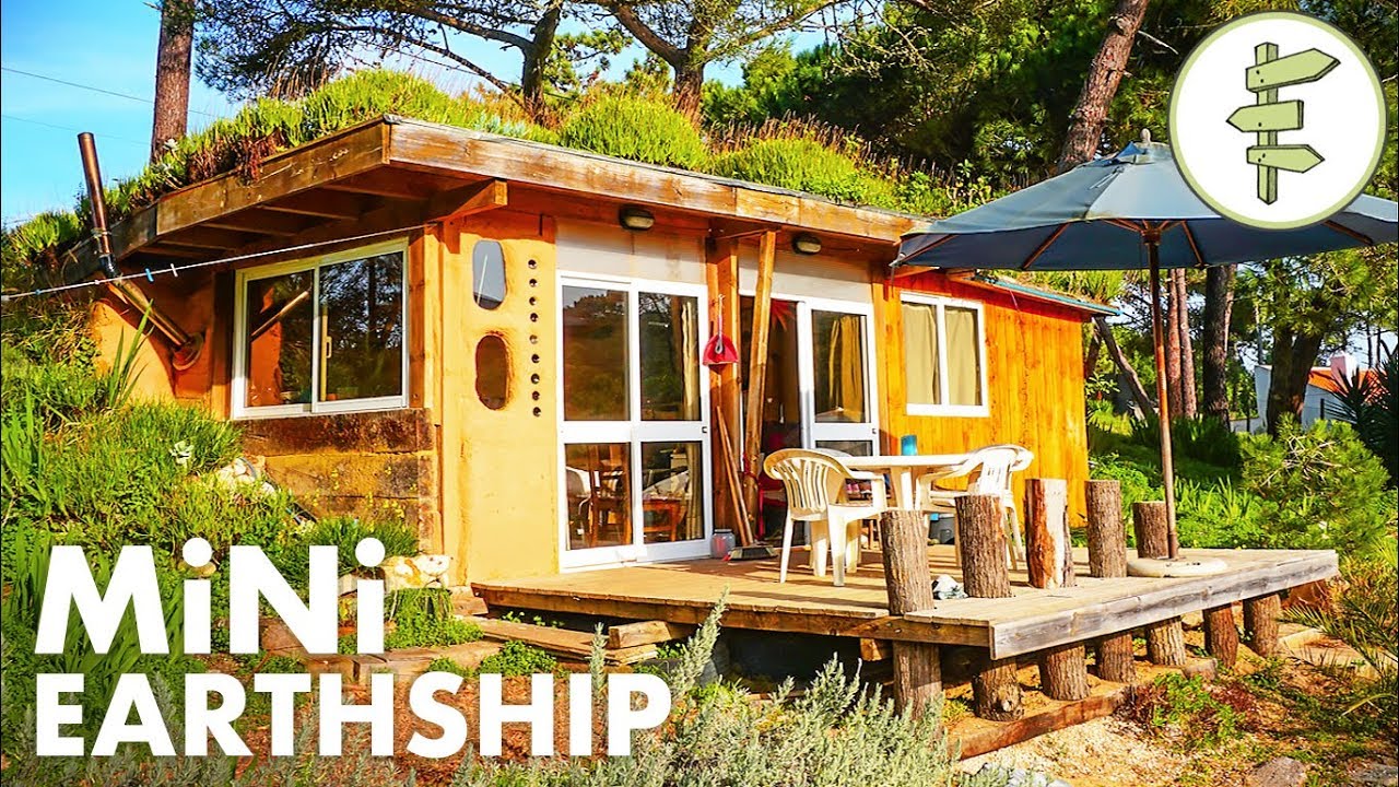 Tiny Earthship Style Cabin Built with Recycled Tires & Green Roof