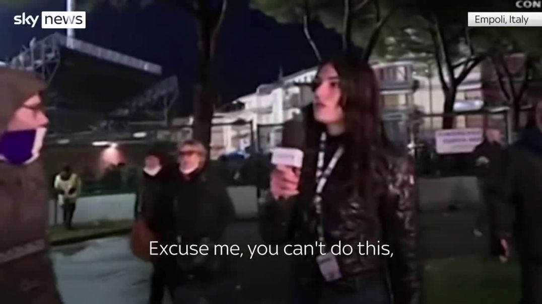 Italian reporter has her arse slapped on live tv