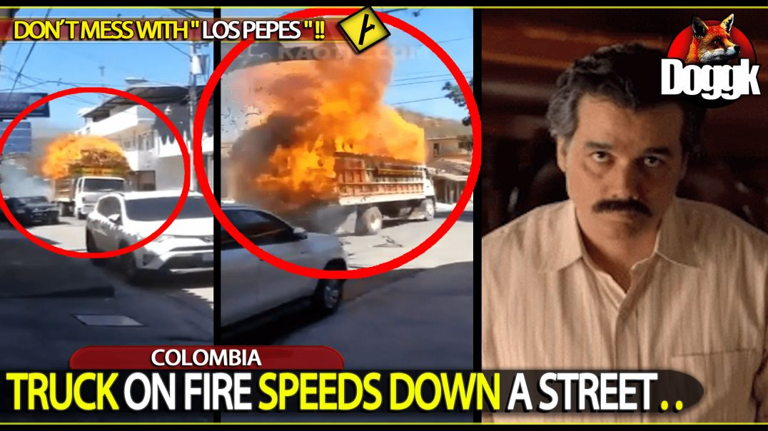 TRUCK ON FIRE SPEEDS DOWN A STREET.. (COLOMBIA)