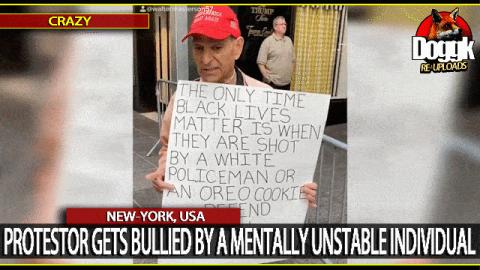PROTESTOR GETS BULLIED BY A MENTALLY UNSTABLE INDIVIDUAL.. (NEW-YORK, USA)