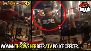 WOMAN THROWS HER BEER AT A POLICE OFFICER... (BRAZIL)