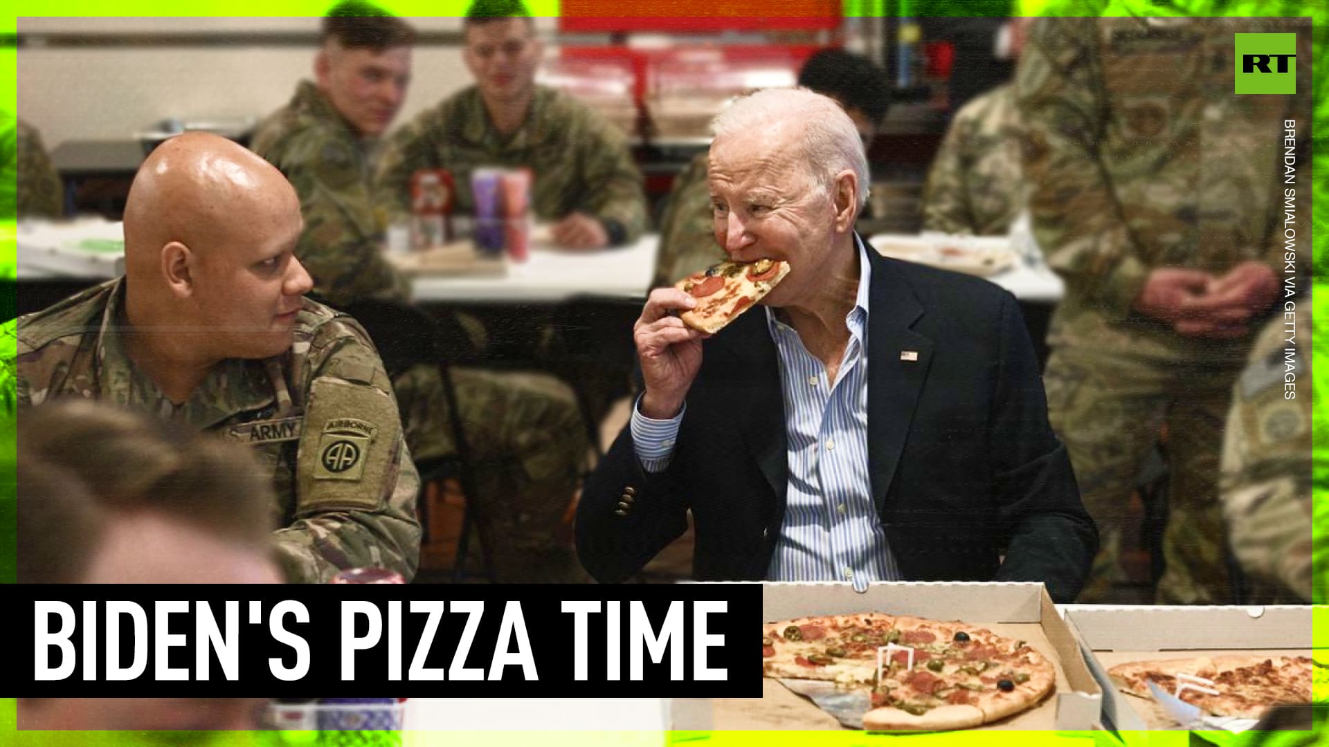 Biden eats pizza with US troops in Poland