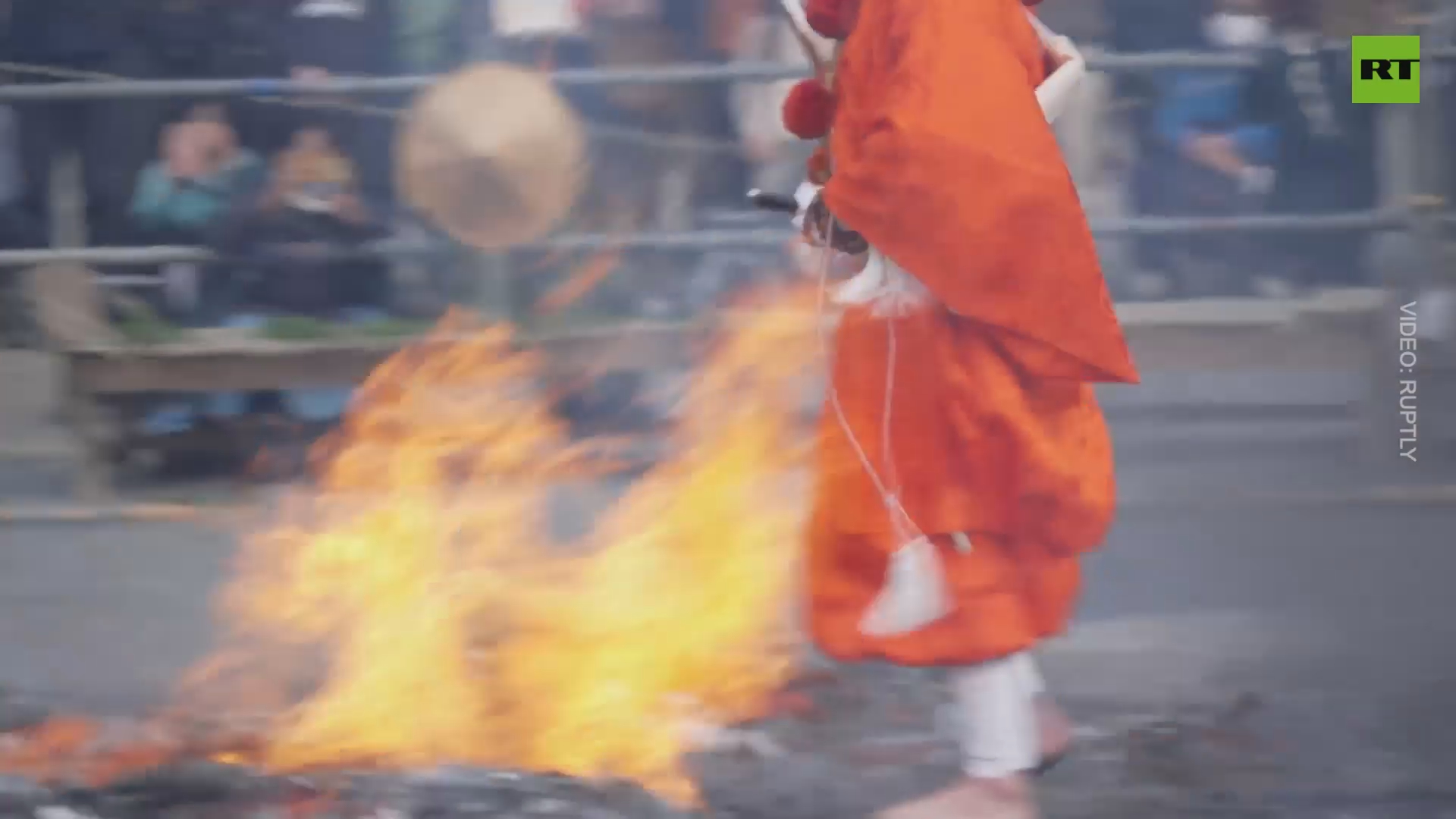 Buddhist monks fire-walk for peace in Japan