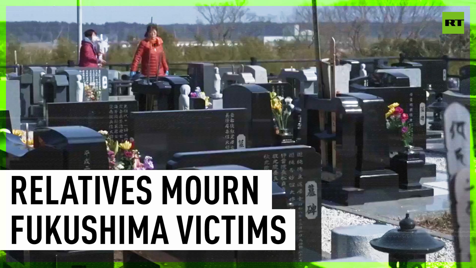 Relatives of 2011 earthquake victims gather at Fukushima cemetery