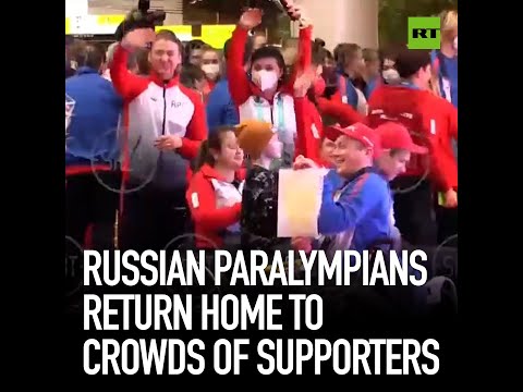 Russian Paralympians return home to crowds of supporters