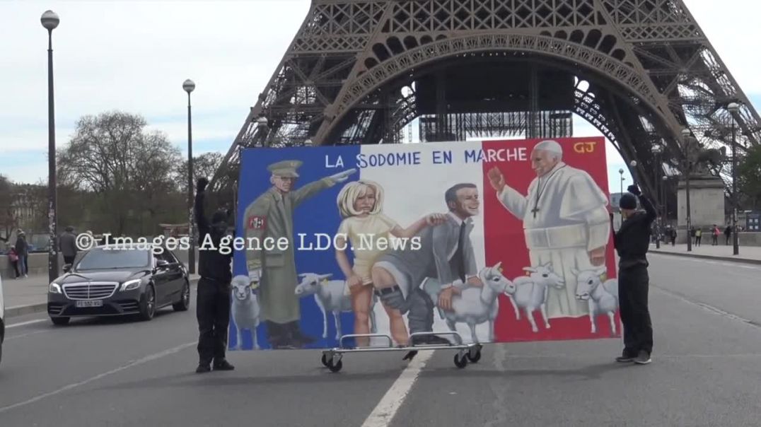 Caricature of Macron Yellow Vests in front of Eiffel Tower , April 4th 2022.