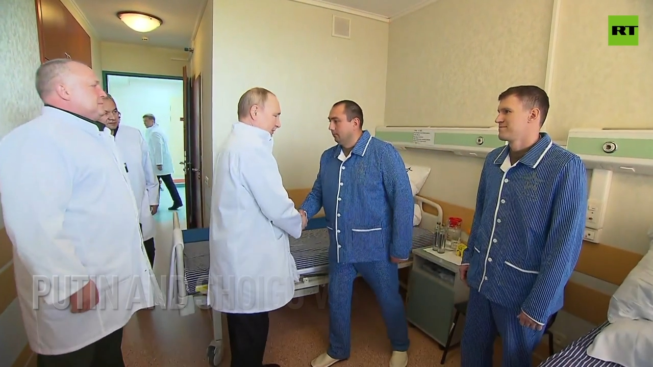 Putin and Shoigu visit wounded troops in military hospital