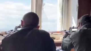 A pair of DPR volunteer snipers, against Ukrainian nationalists in the Azovstal region.