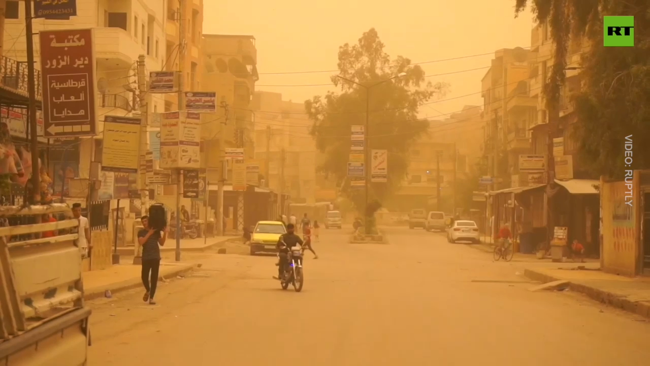 Dust storms cast orange hue in Syria