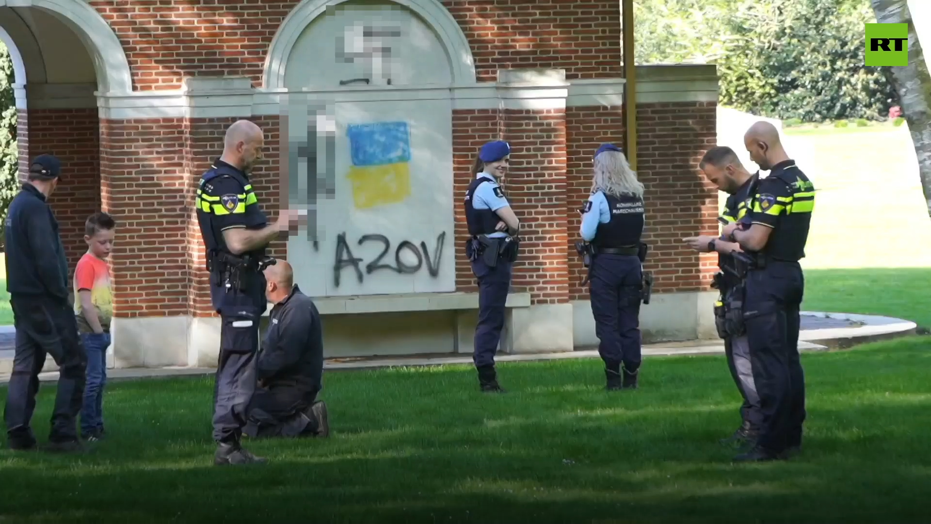 War cemetery in Netherlands sprayed with swastikas & Ukraine flags