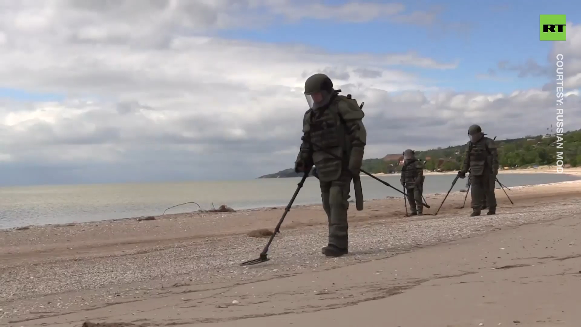 Russian sappers and service doggos demine Mariupol coastline