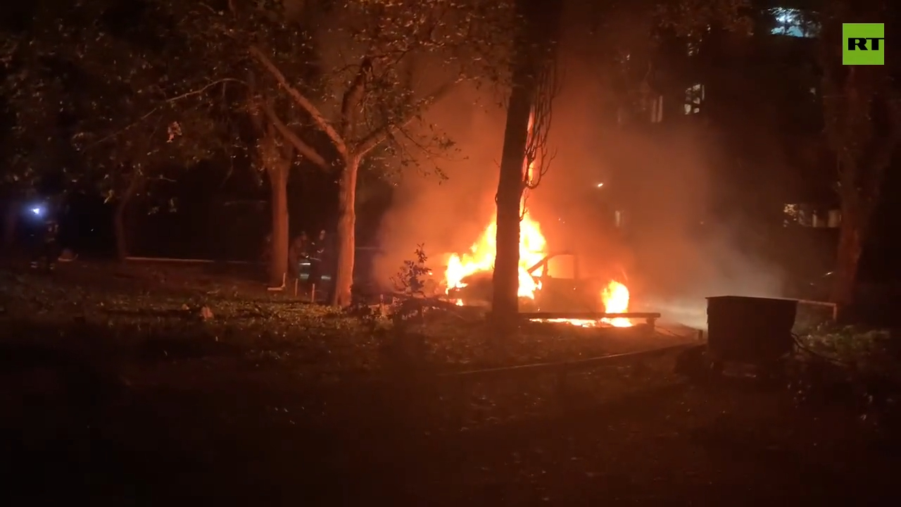 Cars on fire following Ukrainian airstrike in Donetsk