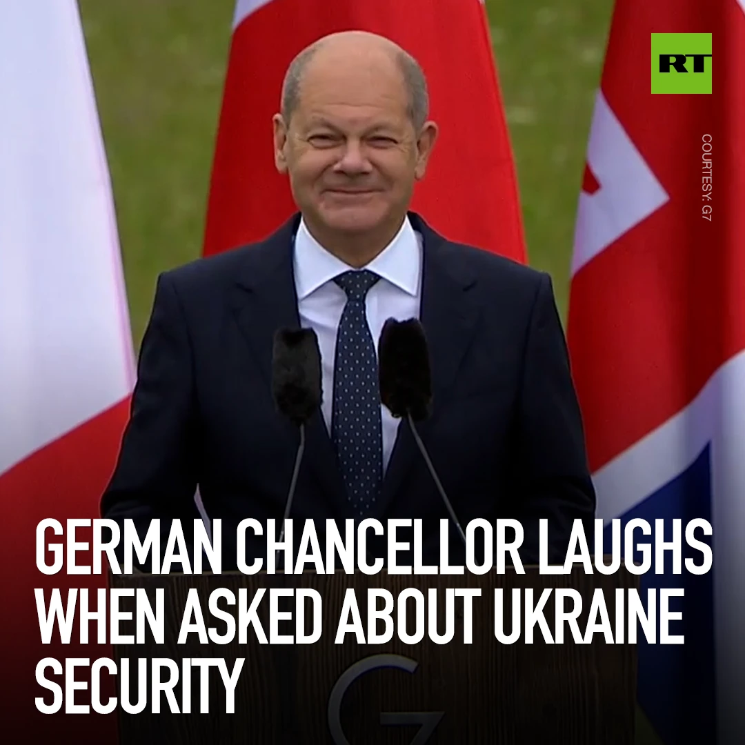 German chancellor laughs when asked about Ukraine security