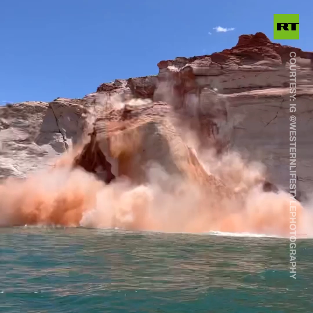 Massive cliff crashes into lake