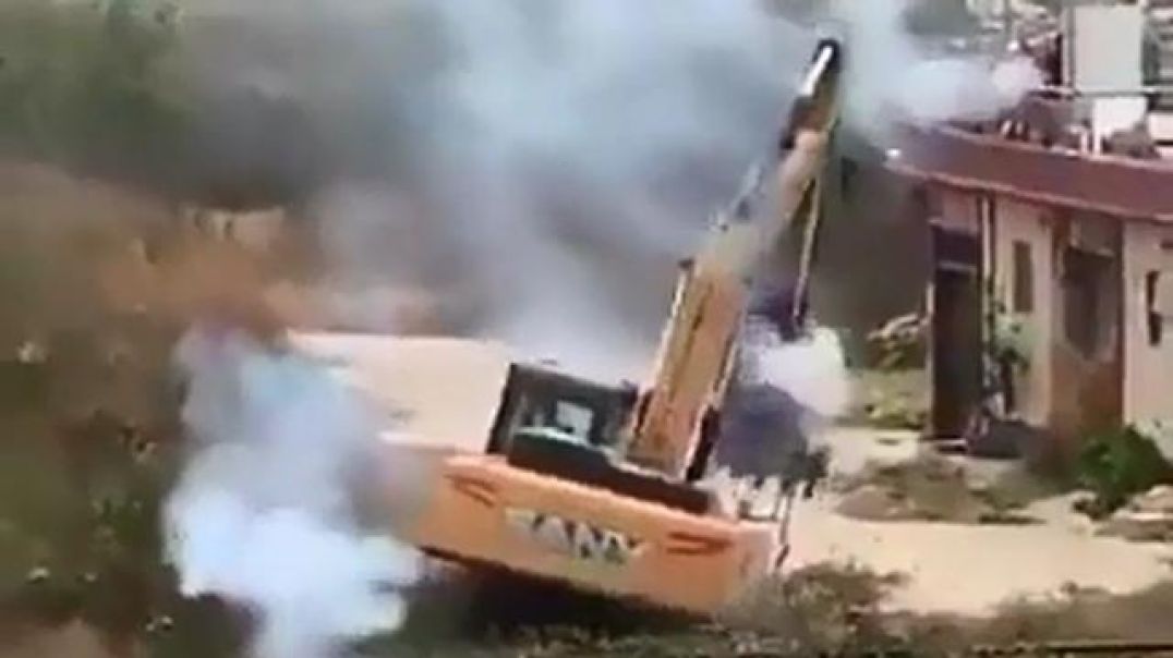 Chinese man tries to defend his home from demolition by using fireworks!