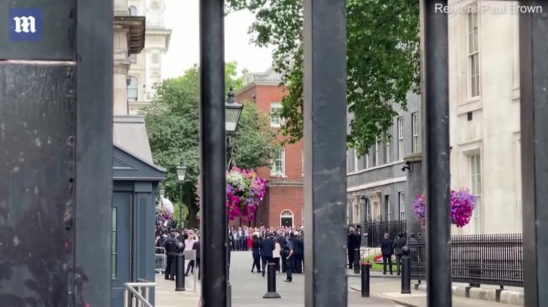 Crowd boos out of Downing Street as Boris Johnson resigns as PM