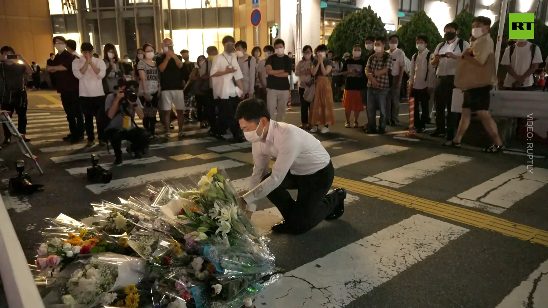 Nara residents lay flowers at site of Abe’s assassination