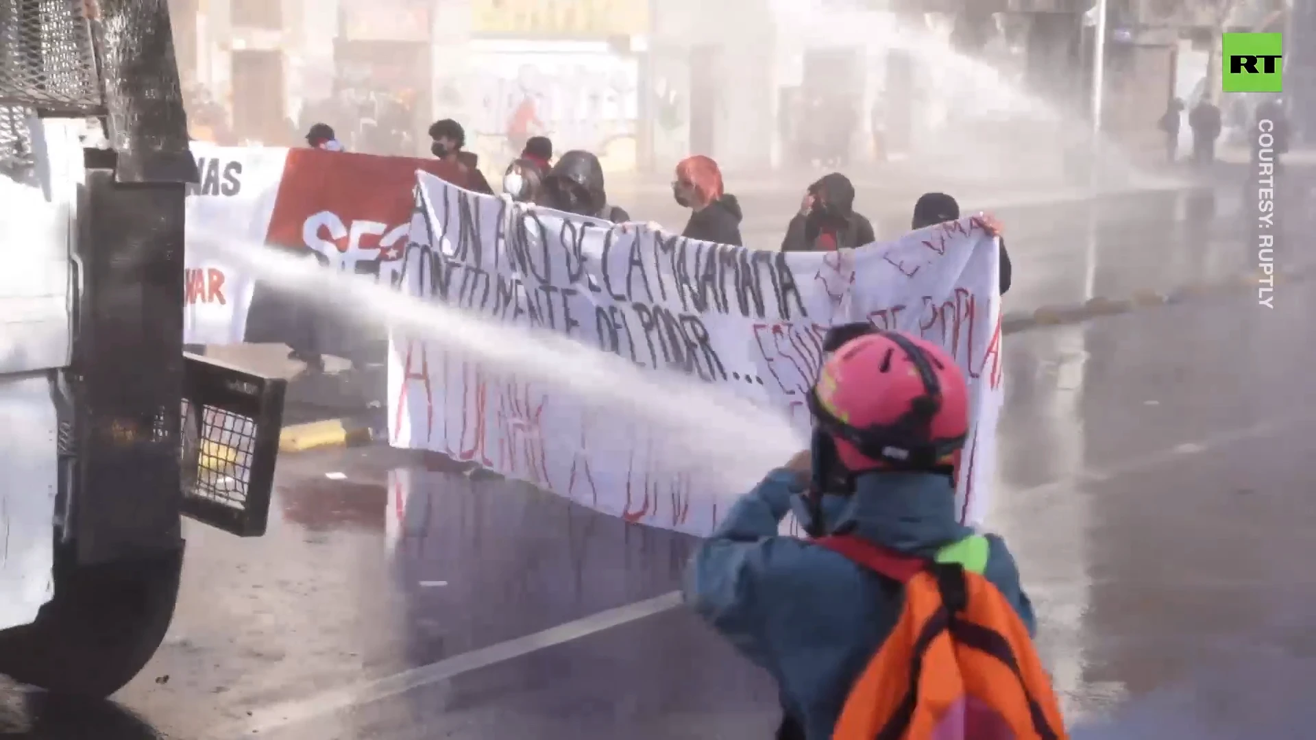 Police deploy water cannons to disperse protesters in Chile