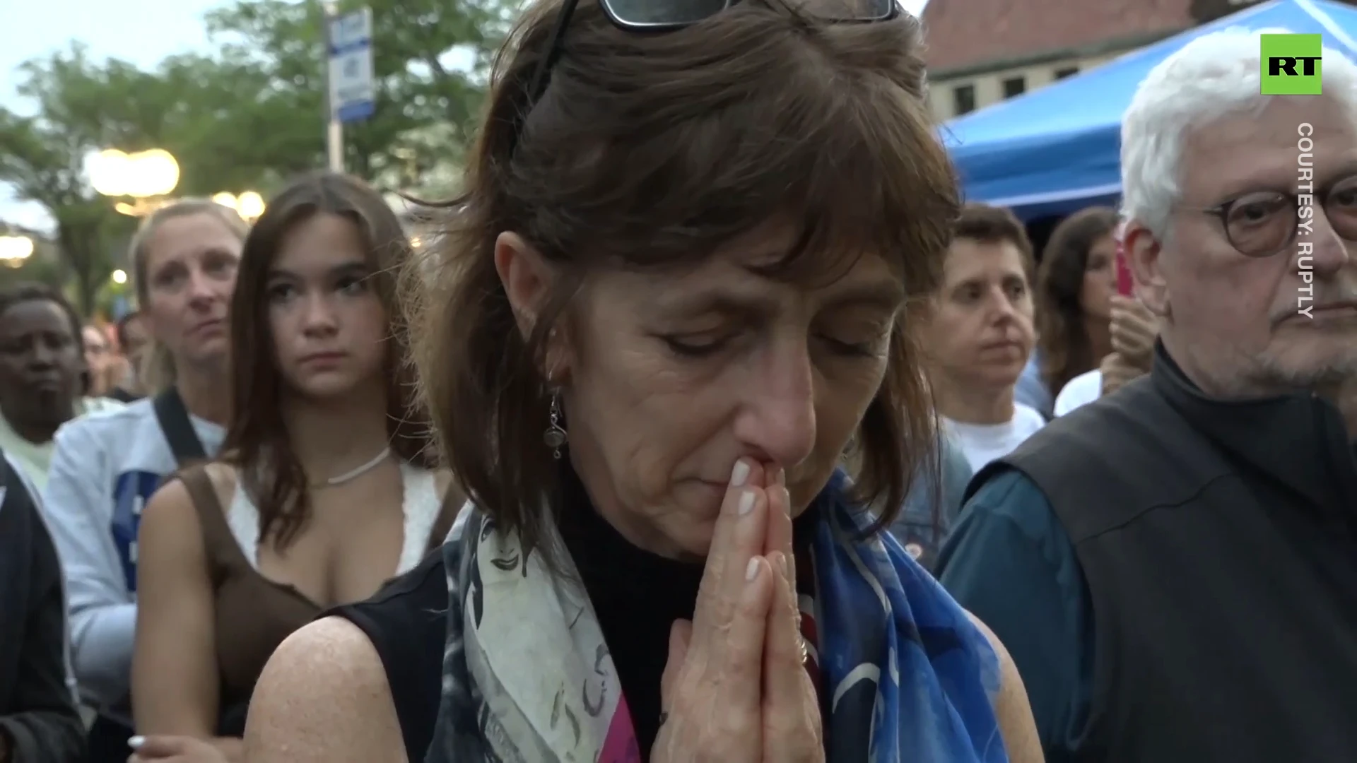 'Nowhere is safe'| Highland Park locals hold vigil for mass shooting victims