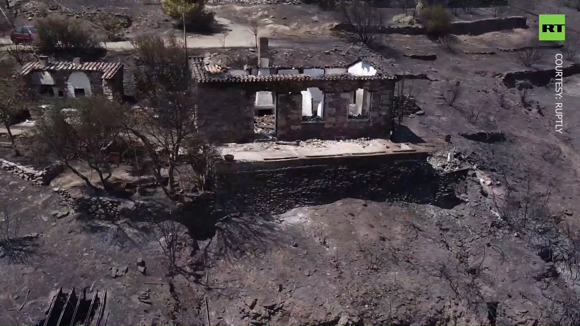 Drone footage: Aftermath of massive wildfire near Athens