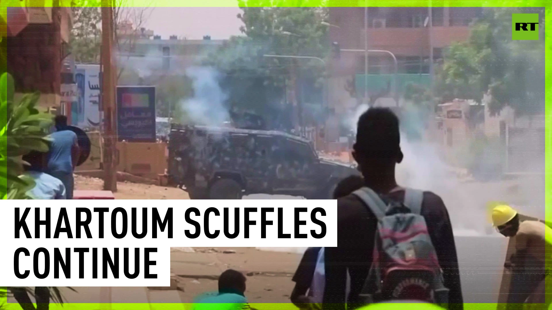 Pro-democracy protesters scuffle with police in Khartoum