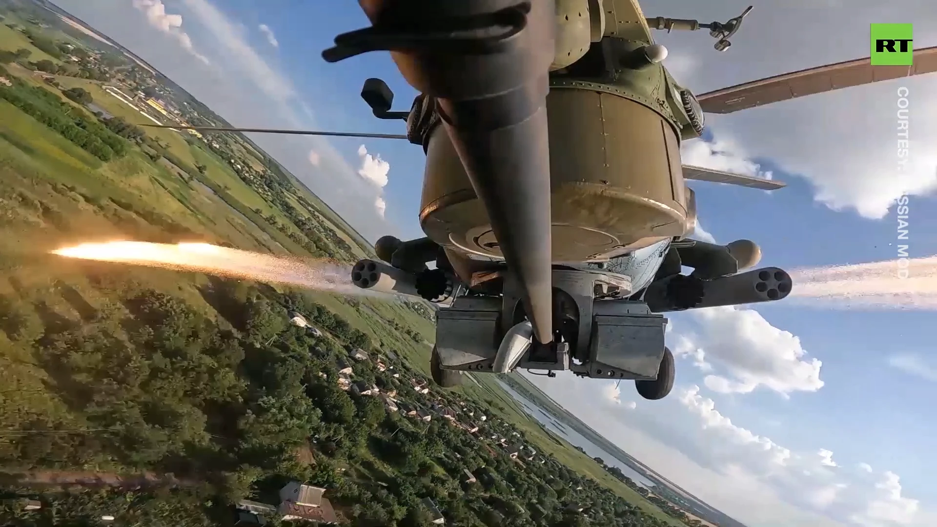 Mi-28 helicopters fire missiles at low altitudes