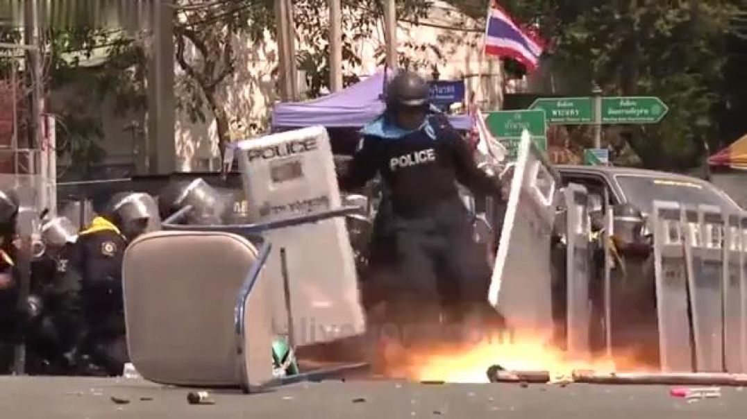 Police trying to kick a grenade during a protest.. Emphasis on tries. | 18+