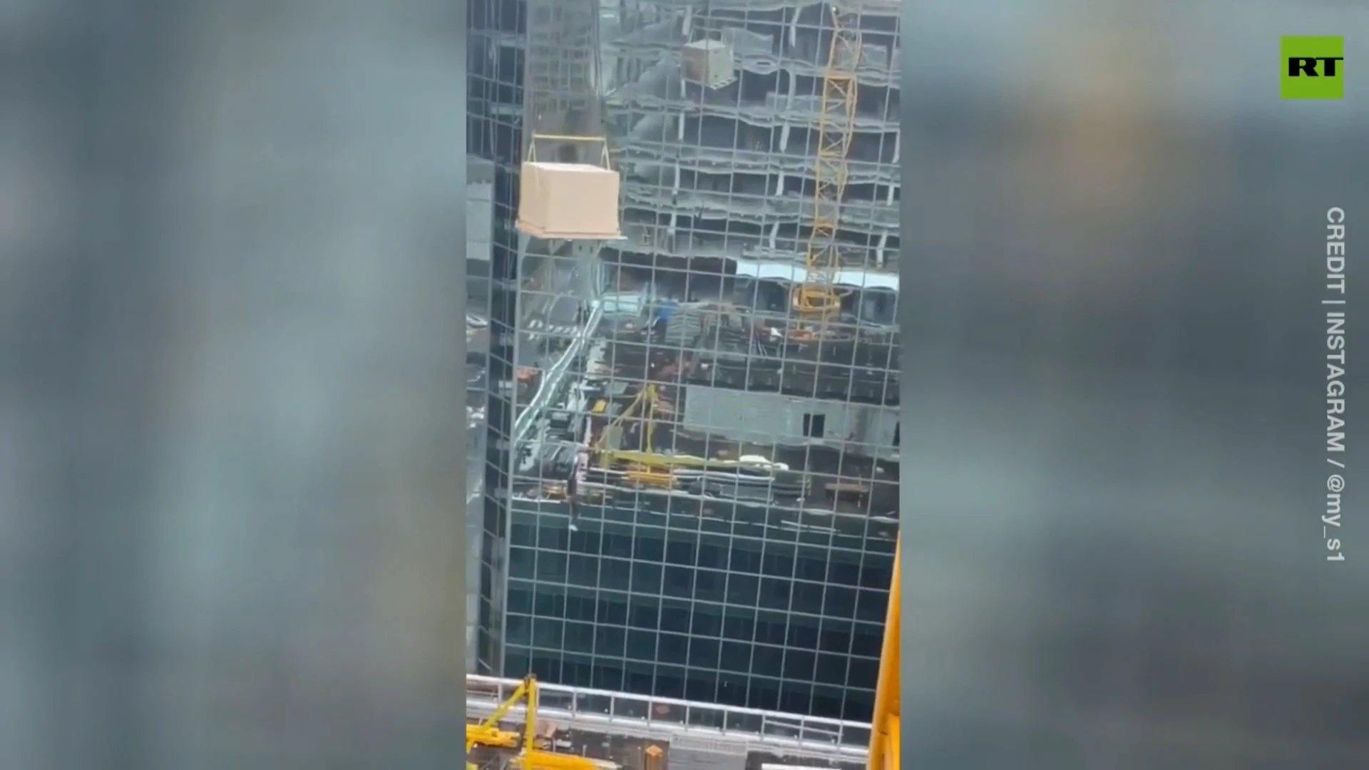 ‘How the f*** did that happen?’ Construction worker dangles from crane