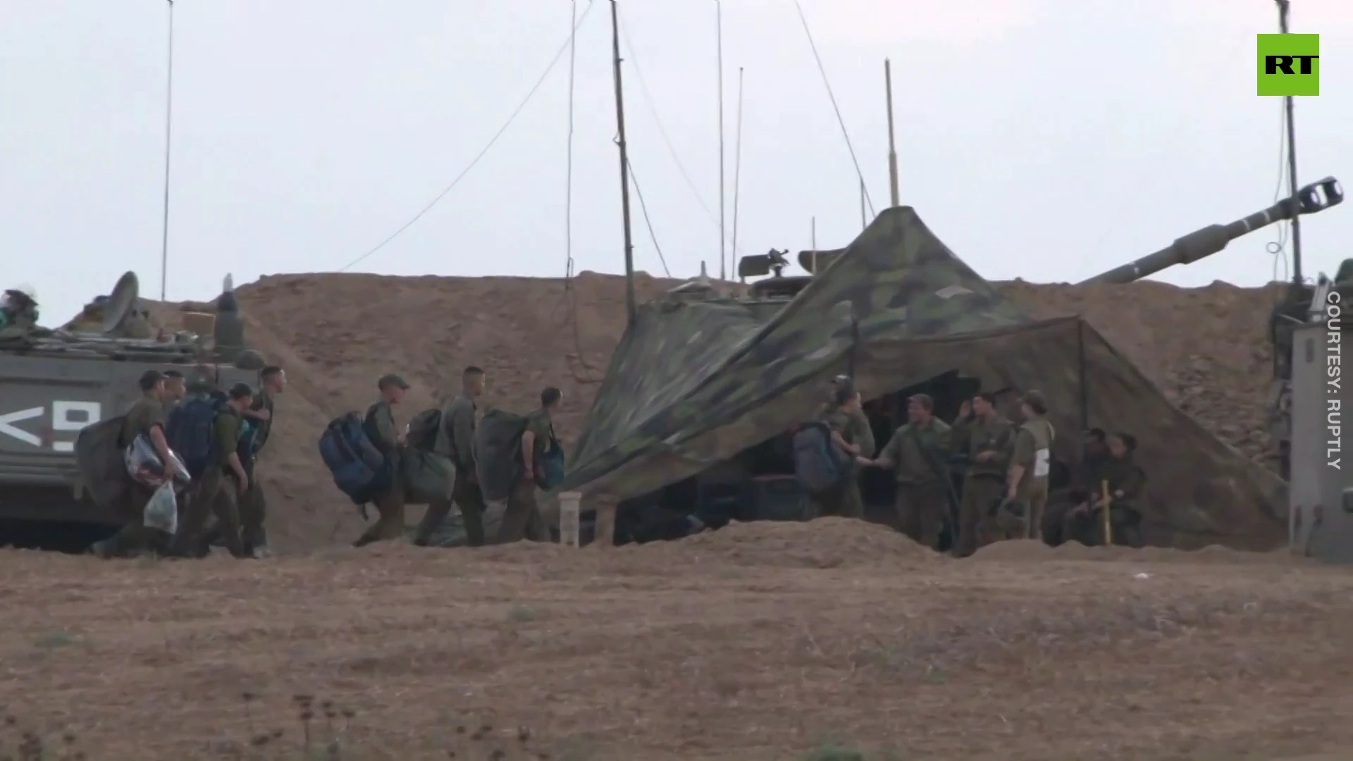 IDF personnel watch Iron Dome intercepting Palestinian rockets at Gaza border