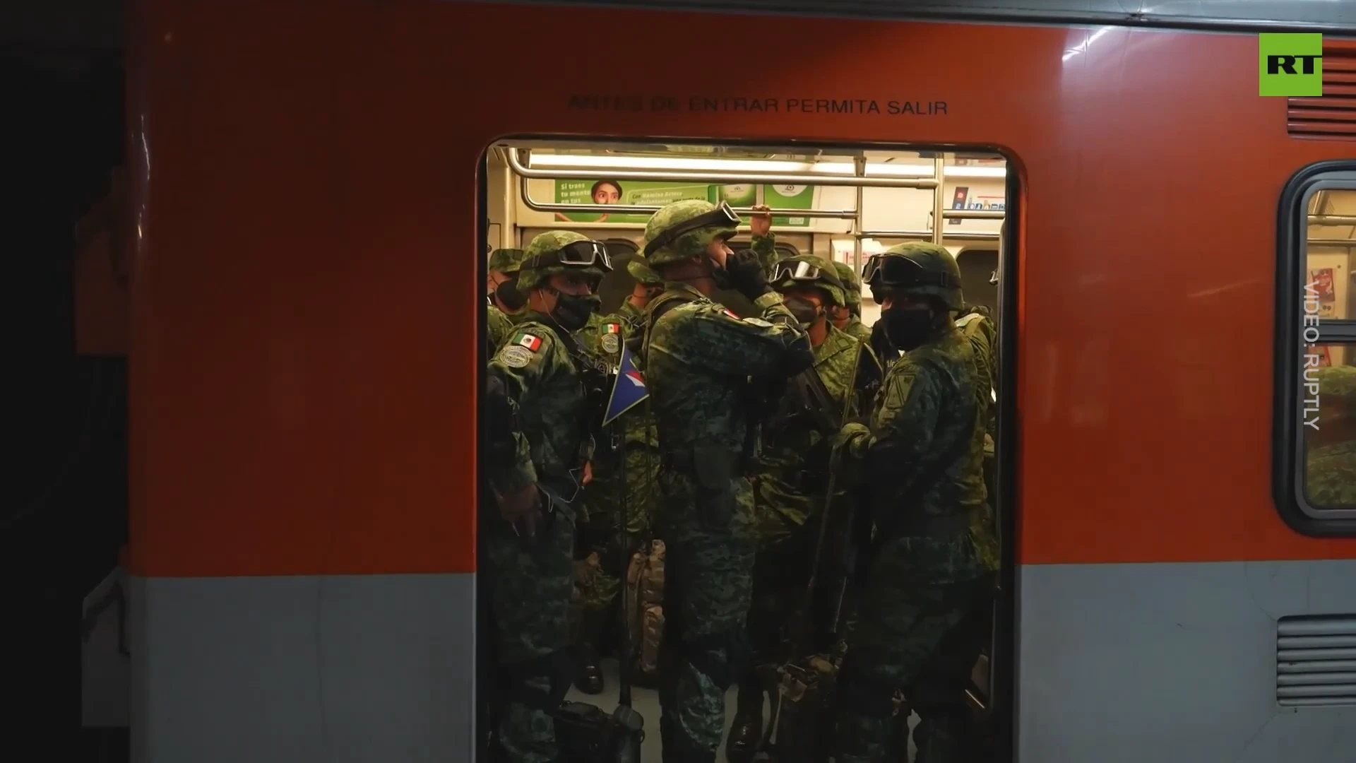 Soldiers casually riding Mexico City metro ahead of Independence Day military parade