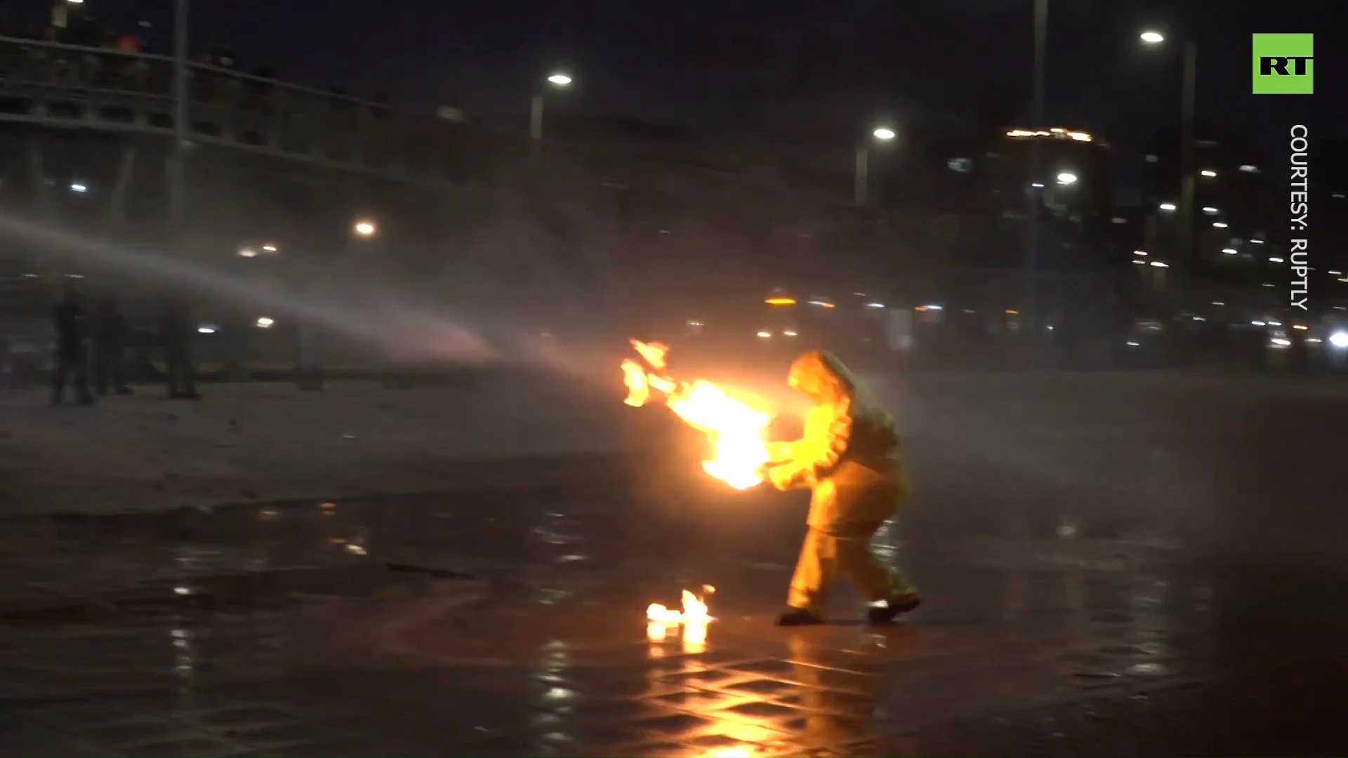 Violent clashes erupt between protesters & cops in Bogota