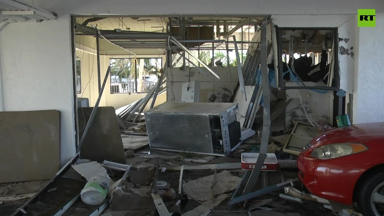 Boats and debris line Fort Myers streets as Hurricane Ian strikes