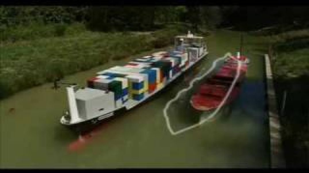 Passing moored ship in a canal with manned ship models at Port Revel Shiphandling Training Centre