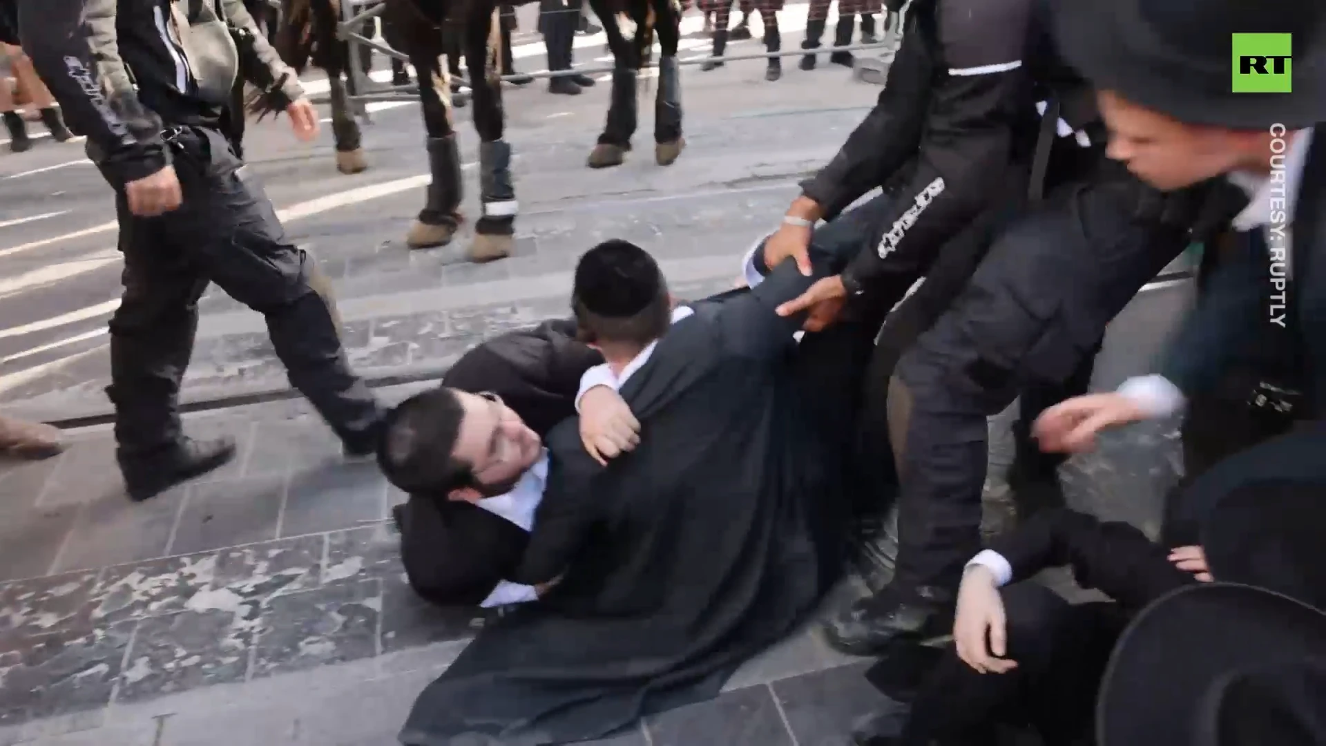 Ultra-Orthodox Jews clash with police over military service