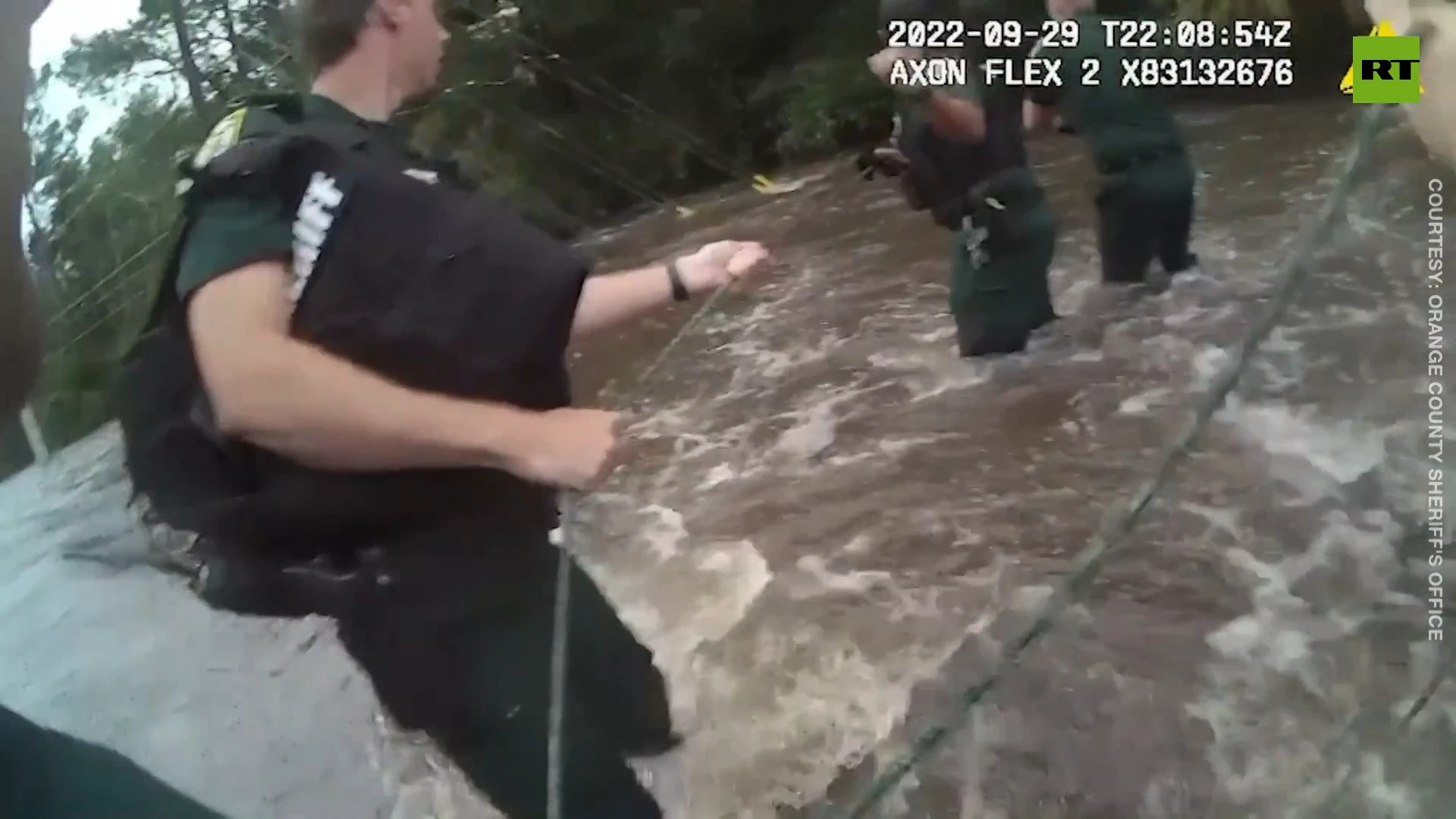 Florida deputies rescue woman whose car was swept away by rushing river