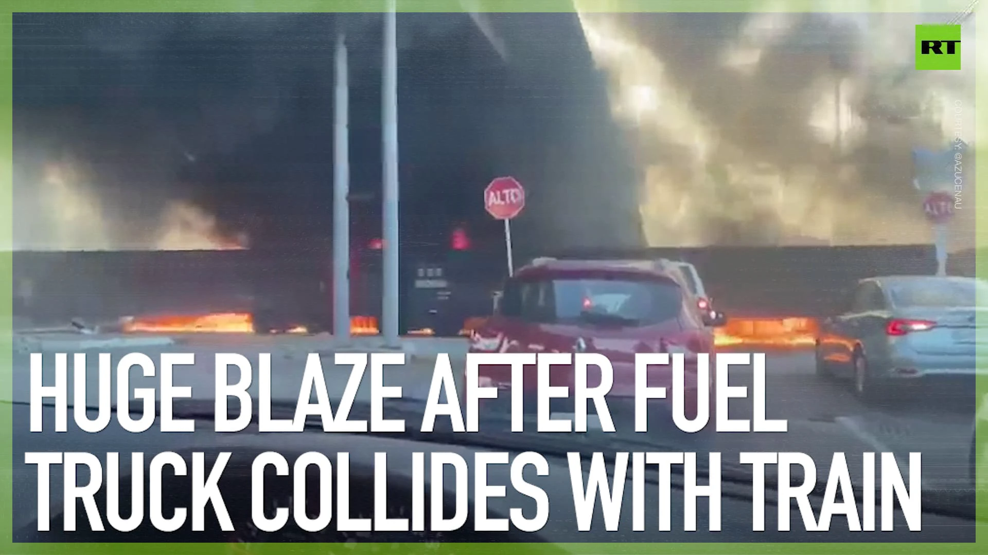 Huge blaze as train speeds through fuel-truck crash scene