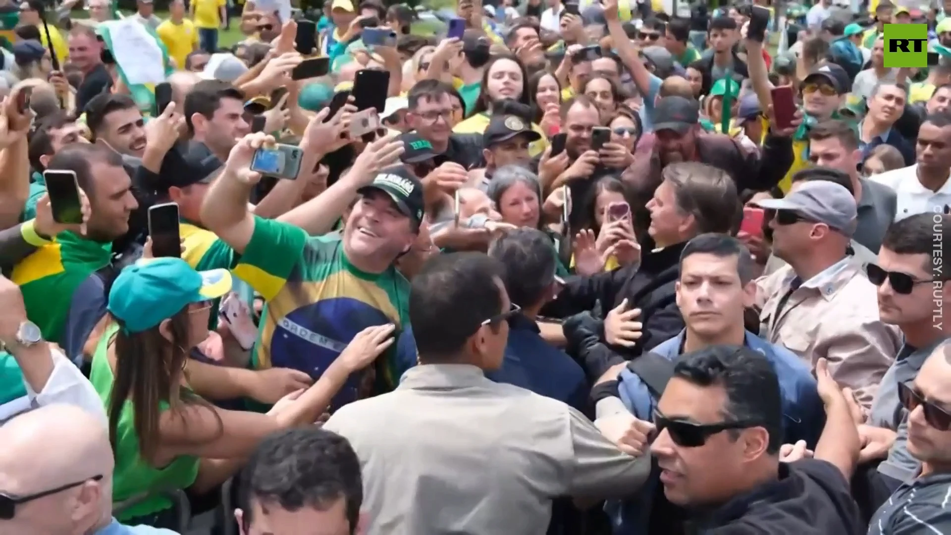 Brazilian president leads motorcade & attends rally by supporters ahead of elections