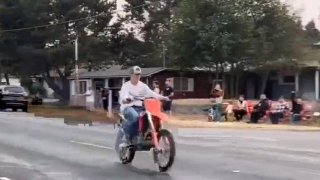 Man On Dirt Bike Laps Cop And Loses Him As Onlookers Cheer