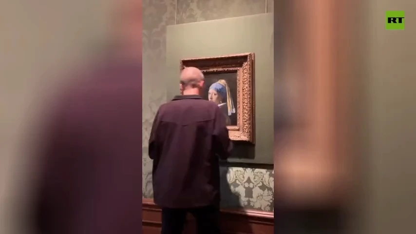 Man glues head to iconic painting