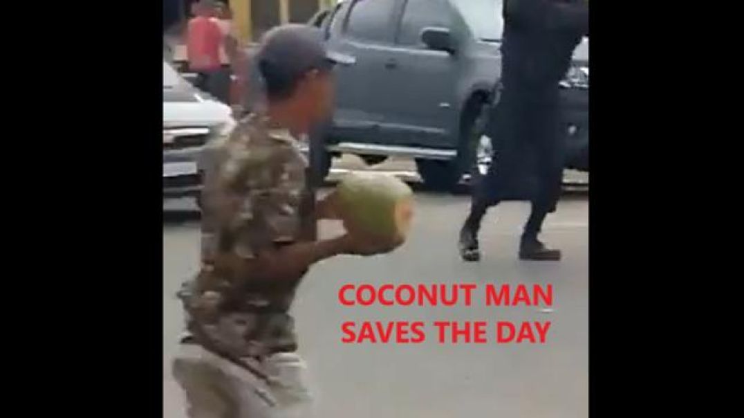 Knife wielding man in fight with cop with a shotgun is taken out by dude with a coconut. Crazy times