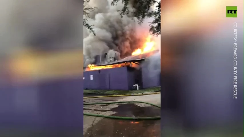 Inferno at fireworks store after car crash