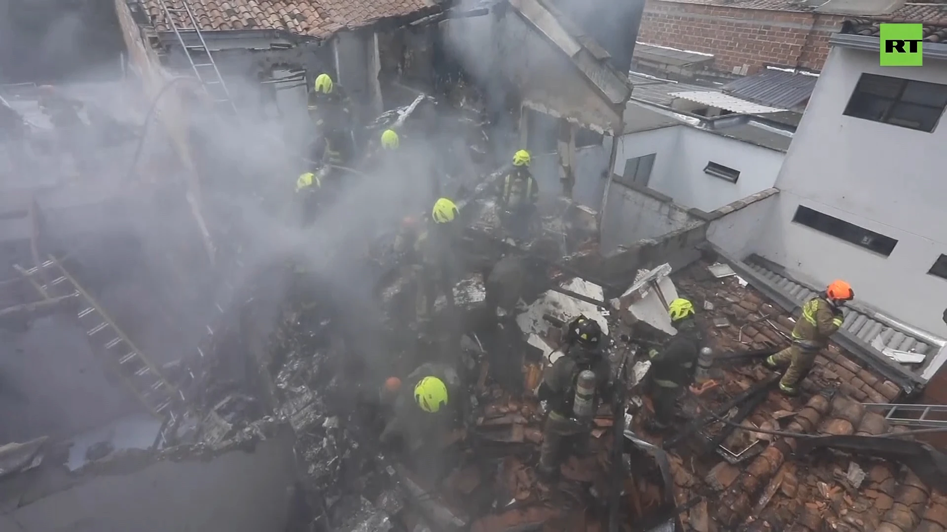 Plane crashes into residential area in Colombia