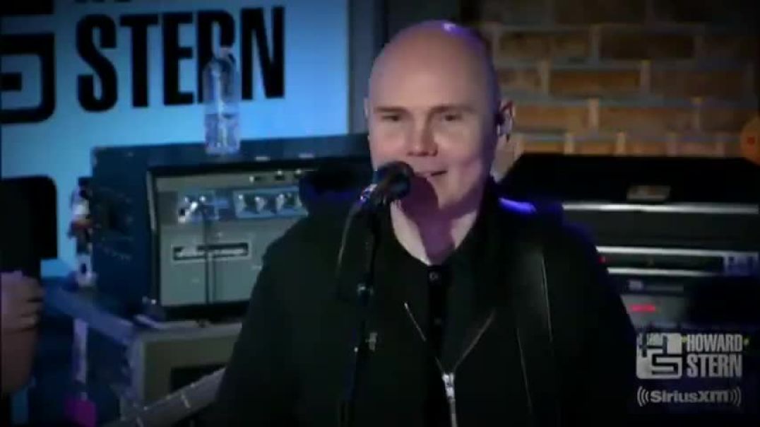 LEAD SINGER OF SMASHING PUMKINS BILLY CORGAN TELLS HOWORD STERN HE SLEPT WITH SHAPESHIFTER