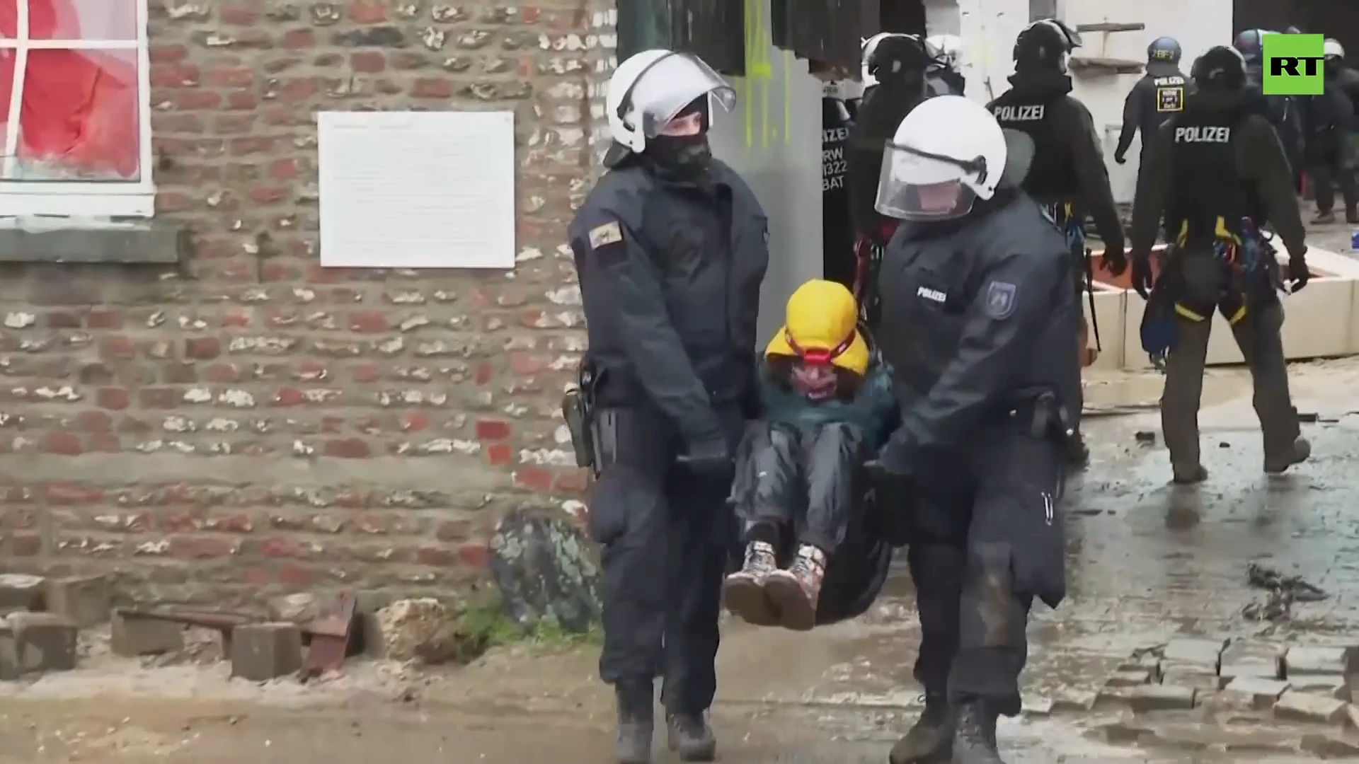 Police drag climate activists out of German village over coal mine expansion